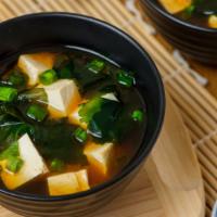 Miso Soup · Soybean broth with soft Tofu, scallions and dried seaweed.