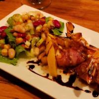 Shrimp Toscana · Wrapped in bacon and grilled over mixed greens with a tuscan bean salad.