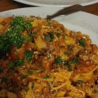 Tagliatele Bolognese Pasta Dinner · Bolognese meat sauce and pecorino Romano.