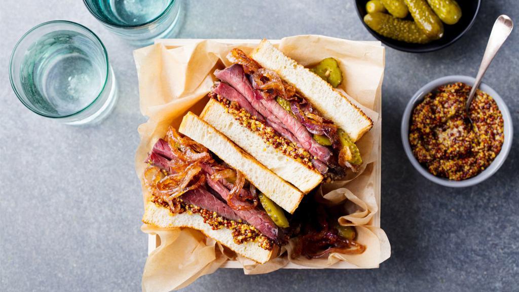 Danny'S Pastrami Delight Sandwich Roll · Hot pastrami, Swiss cheese, lettuce, tomato and mustard, on a fresh roll.