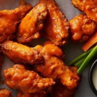 Classic Jumbo Chicken Wings · 6 pieces tossed in your choice of sauce. Gluten-free. choice of honey chipotle, buffalo sauc...