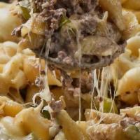 Butcher'S Mac & Cheese · Shell pasta mixed with chef’s special blend, grass fed NY strip steak, smoked bacon lardons,...