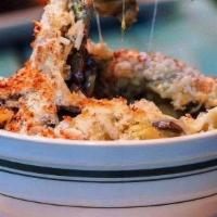 Truffle Mac & Cheese · Shell pasta mixed with chef’s special blend, cremini mushrooms, the truffle oil, topped with...