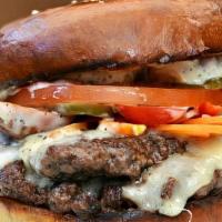 Southern Burger · 8 oz. organic Angus beef served with lettuce, tomatoes, onions, and homemade pickles topped ...