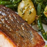 Pan Seared Atlantic Salmon · Roasted vegetables, organic quinoa, and yuzu sauce.