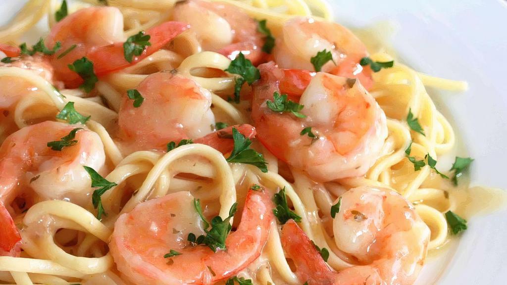 Linguini Shrimp Scampi · Marinated wild gulf shrimps, parsley, thyme, garlic, butter, white wine lemon sauce, 5 months aged parmesan cheese. Served with fresh bread, choice of optional protein and vegetable add ons.