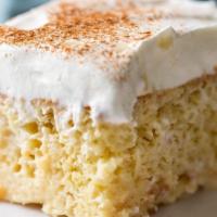 Tres Leches Dessert · Three milks cake, ultra light sponge cake soaked in a sweet milk mixture topped with cinnamo...
