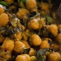 Chana Masala · Made with onion, garlic, fresh cilantro, a blend of spices, mix with chickpeas, and tomatoes