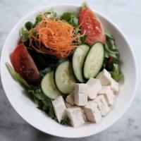 Tofu Salad · Cubed organic tofu and dried yuba on a bed of organic
greens. Comes with choice of dressing.
