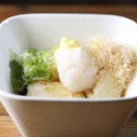 Agedashi Tofu · Deep fried organic tofu and served in tempura sauce with garnishes.