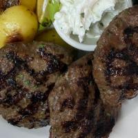 Biftekia (Beef Patties) Platter  · Beef loin patties, seasoned & grilled with tzatziki & lemon wedges served with a side salad.
