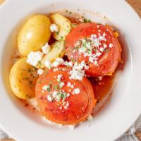Yemista · Tomatoes stuffed with rice, herbs & ground beef, baked until juicy & fragrant, served with a...