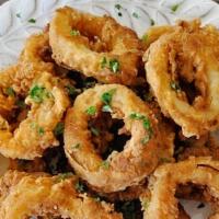 Fried Calamari · Perfectly crispy squid rings.