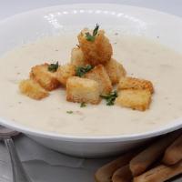 New England Clam Chowder · clam meat, potatoes, onion, celery, thyme, wheat flour, spices. Served with croutons and
bre...
