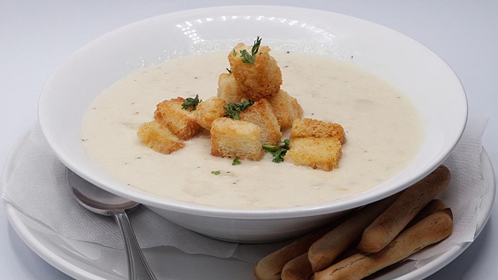 New England Clam Chowder · clam meat, potatoes, onion, celery, thyme, wheat flour, spices. Served with croutons and
breadsticks on the side.