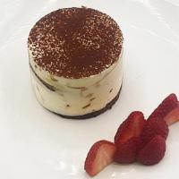 Tiramisu · Espresso infused vanilla cake with mascarpone cream