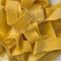Fresh Tagliatelle Pasta · Individual pieces of tagliatelle are long, flat ribbons that are similar in shape to fettucc...