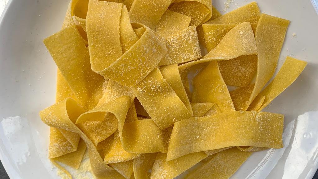 Fresh Tagliatelle Pasta · Individual pieces of tagliatelle are long, flat ribbons that are similar in shape to fettuccine and are typically about 6.5 to 10 mm (0.26 to 0.39 in) wide. Tagliatelle can be served with a variety of sauces, though the classic is a meat sauce or Bolognese sauce.