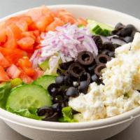 Greek Salad · Lettuce, tomato, cucumbers, pepper, feta cheese and olives.