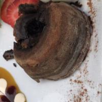 Chocolate Lava Cake · Melted chocolate ganache with vanilla ice cream.