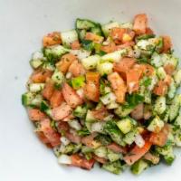 Armenian Salad · A concoction of diced vegetables, including tomatoes, cucumber and onions, topped with the f...