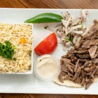 Shawarma Platter · An old city original: thinly sliced top sirloin, marinated with our blend of spices, cooked ...