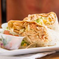 Burritos · Chopped steak or chicken, rice, bean, and cheese wrapped in a giant flour tortilla topped wi...