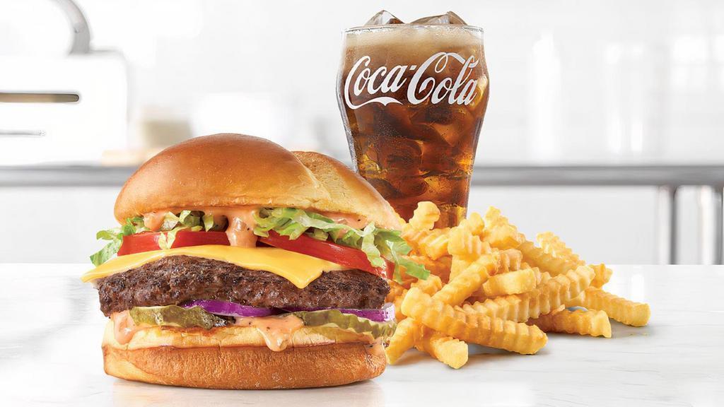 Deluxe Wagyu Steakhouse Burger · A Wagyu beef burger topped with American cheese, shredded lettuce, tomato, pickles, red onions, and a special burger sauce on a toasted buttery brioche bun. Visit arbys.com for nutritional and allergen information.