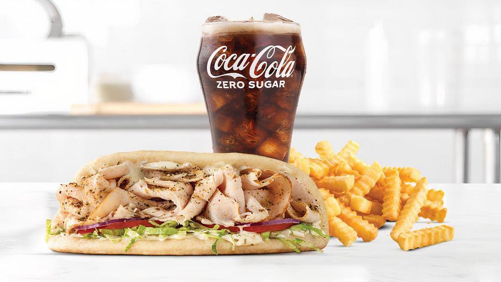 Turkey Gyro · Thinly sliced roast turkey with Greek Seasonings, cool creamy tzatziki sauce, lettuce, tomato and red onion in a warm pita. Visit arbys.com for nutritional and allergen information.
