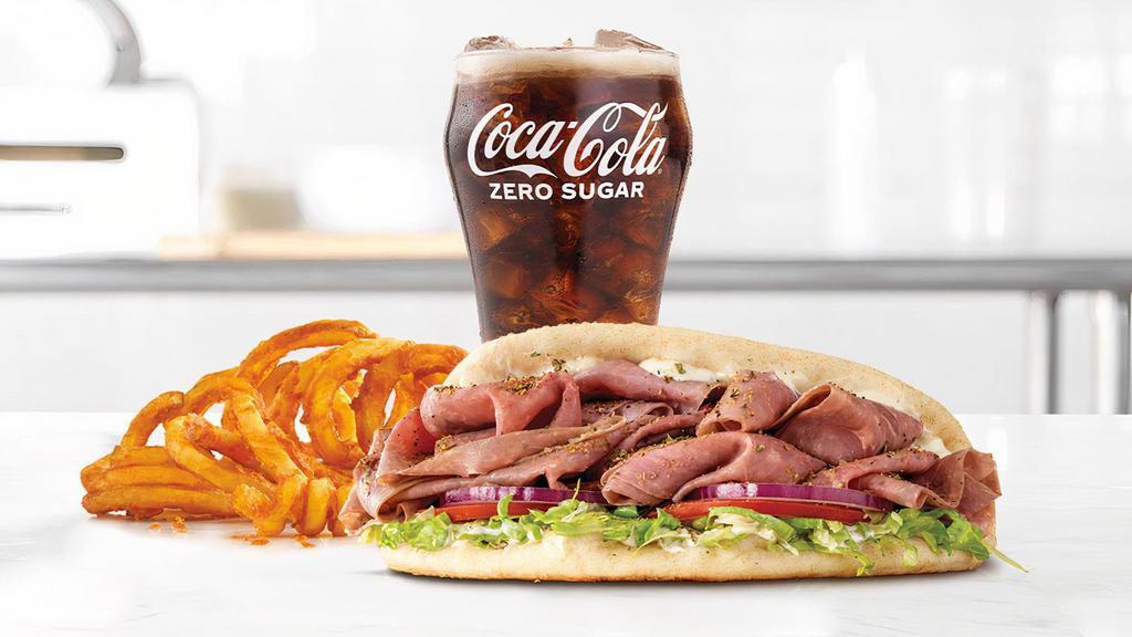 Roast Beef Gyro · Thinly sliced roast beef with Greek Seasonings, cool creamy tzatziki sauce, lettuce, tomato and red onion in a warm pita. Visit arbys.com for nutritional and allergen information.