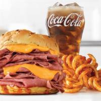 Half Pound Beef 'N Cheddar · A half pound of thinly sliced roast beef, with warm cheddar sauce and zesty red ranch sauce ...