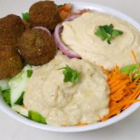 Mediterranean Salad · Bed of romaine lettuce, a scoop of hummus, Baba ghanouj and two baked falafels, touch of cum...
