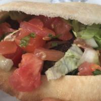 Falafel Sandwich · Ground chickpeas, onion, parsley, garlic and tahini.