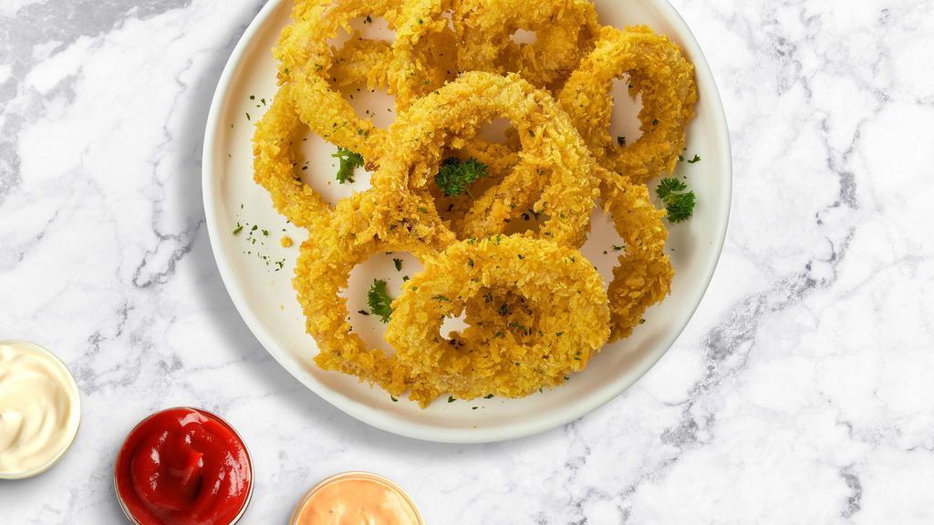 Onion Wonderland  · Sliced onions dipped in a light batter and fried until crispy and golden brown.