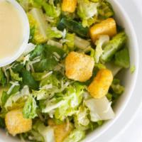 Caesar Salad · Romaine hearts, Parmesan cheese, croutons and caesar dressing.