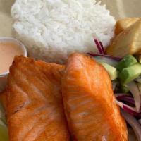 Salmon Special · Pan fried Salmon served with white rice, fried yuca and salsa criolla.