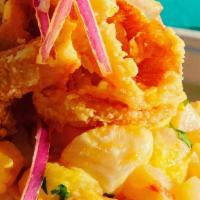Carretillero · Mixed ceviche served with fried calamari.