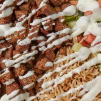 Lamb Over Rice Combo · Lamb strips with With grilled onions and bell peppers and rice served with a free drink and ...