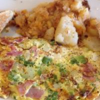 Western Omelette Breakfast · Peppers, onions, and ham.