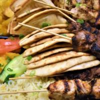 Family Meal 1 (Serves 4) · Choice of 2 dips, choice of a salad, choice of 7 souvlaki sticks, choice of 2 sides, choice ...