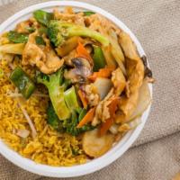 Chicken With Mixed Vegetables · Served with rice.