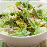 Caesar Salad · Fresh romaine, shaved parmesan, multigrain croutons, and caesar dressing.