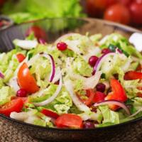 Simple Salad · Romaine lettuce, tomatoes, carrots, cucumber, green peppers, and olives.