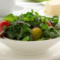 Baby Arugula Salad · Fresh garden salad prepared with Baby arugula, tomatoes, red onions, cranberries, ciliegine ...