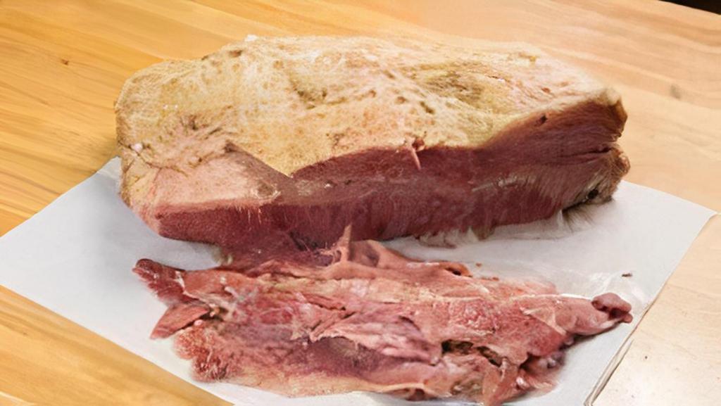 Sliced Corned Beef By The Pound · PACKAGE DETAILS
- This package includes your choice of 2-10 lbs. of Sliced Corned Beef
- Each pound of pastrami makes 2-3 sandwiches

Add on Options Include:

- Rye Bread
- Deli Mustard
- Russian Dressing
- Pickles