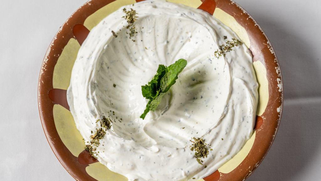 Labneh · Yogurt spread with dry mint and olive oil.