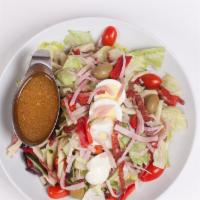 Chef Salad · Iceberg lettuce, tomatoes, olives, provolone, prosciutto, ham, salami & boiled egg topped wi...