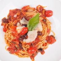 Spaghetti Puttanesca · With olives, capers, anchovies in a light marinara sauce.