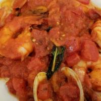 Shrimp Fra Diavolo · With two clams in a spicy marinara sauce.