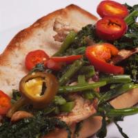 Umberto'S Favorite Grilled Chicken · With broccoli rabe & cherry peppers.